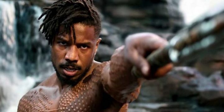 michael-b-jordan-as-erik-killmonger-points-a-spear-at-an-off-screen-chadwick-boseman-as-t-challablack-panther-in-black-panther