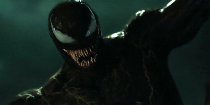 venom-looking-down-and-smiling-in-venom-let-there-be-carnage